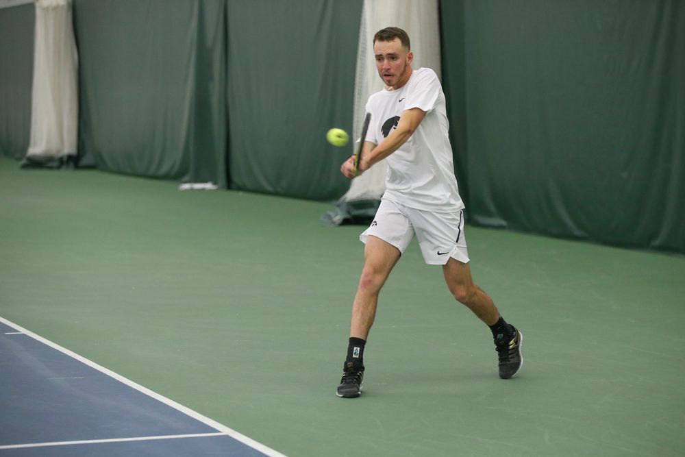Iowa’s Kareem Allaf returns a hit during the Iowa men’s tennis meet vs Nebraska on Sunday, March 1, 2020 at the Hawkeye Tennis and Recreation Complex. (Lily Smith/hawkeyesports.com)