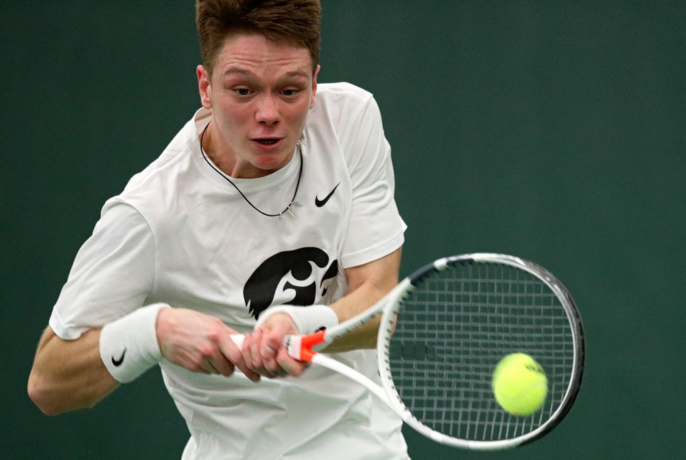 Iowa’s Jason Kerst returns a shot during his singles match at the Hawkeye Tennis and Recreation Complex in Iowa City on Sunday, February 16, 2020. (Stephen Mally/hawkeyesports.com)