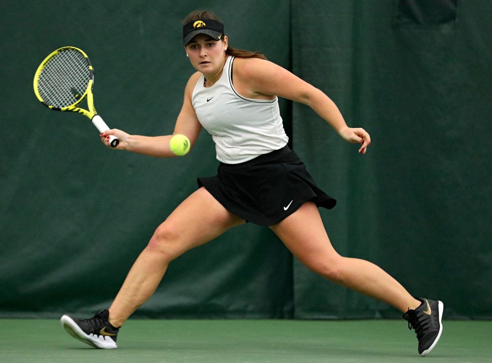Iowa’s Danielle Bauers chases down a shot during her singles match at the Hawkeye Tennis and Recreation Complex in Iowa City on Sunday, February 16, 2020. (Stephen Mally/hawkeyesports.com)