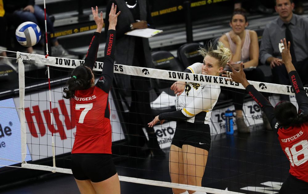 Iowa Hawkeyes right side hitter Reghan Coyle (8) spikes the ball during a match against Rutgers at Carver-Hawkeye Arena on November 2, 2018. (Tork Mason/hawkeyesports.com)