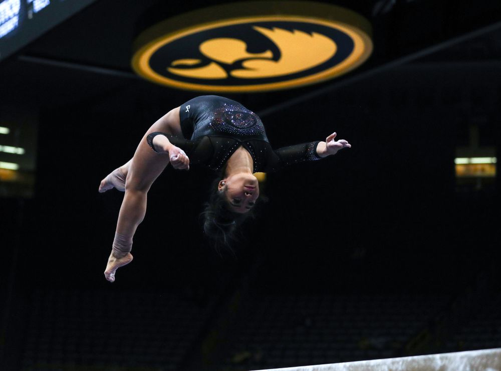 Iowa’s Claire Kaji competes on the beam against Michigan Friday, February 14, 2020 at Carver-Hawkeye Arena. (Brian Ray/hawkeyesports.com)
