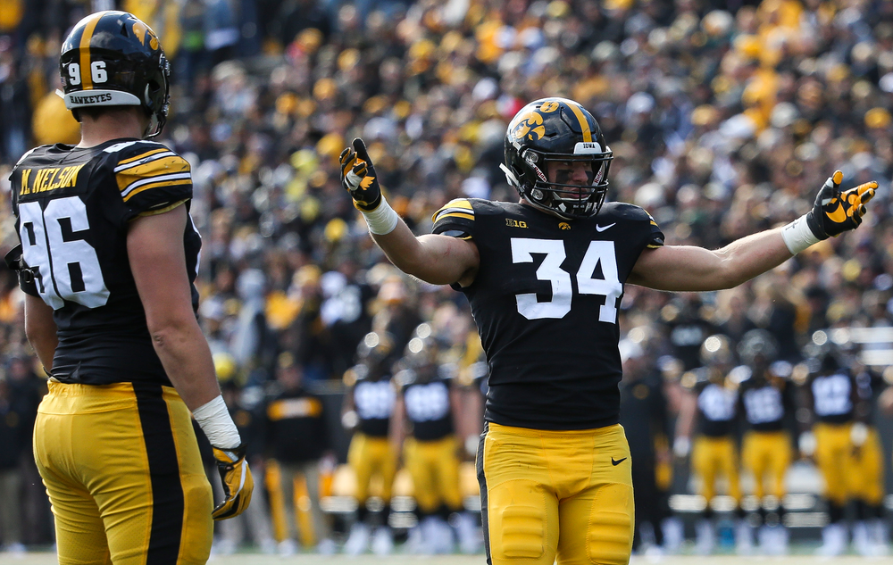 Iowa Hawkeyes linebacker Kristian Welch (34) pumps up the crowd during a game against Maryland at Kinnick Stadium on October 20, 2018. (Tork Mason/hawkeyesports.com)