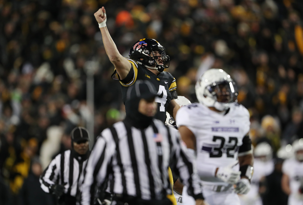 Iowa Hawkeyes quarterback Nate Stanley (4) celebrates a touchdown against the Northwestern Wildcats Saturday, November 10, 2018 at Kinnick Stadium. (Brian Ray/hawkeyesports.com)