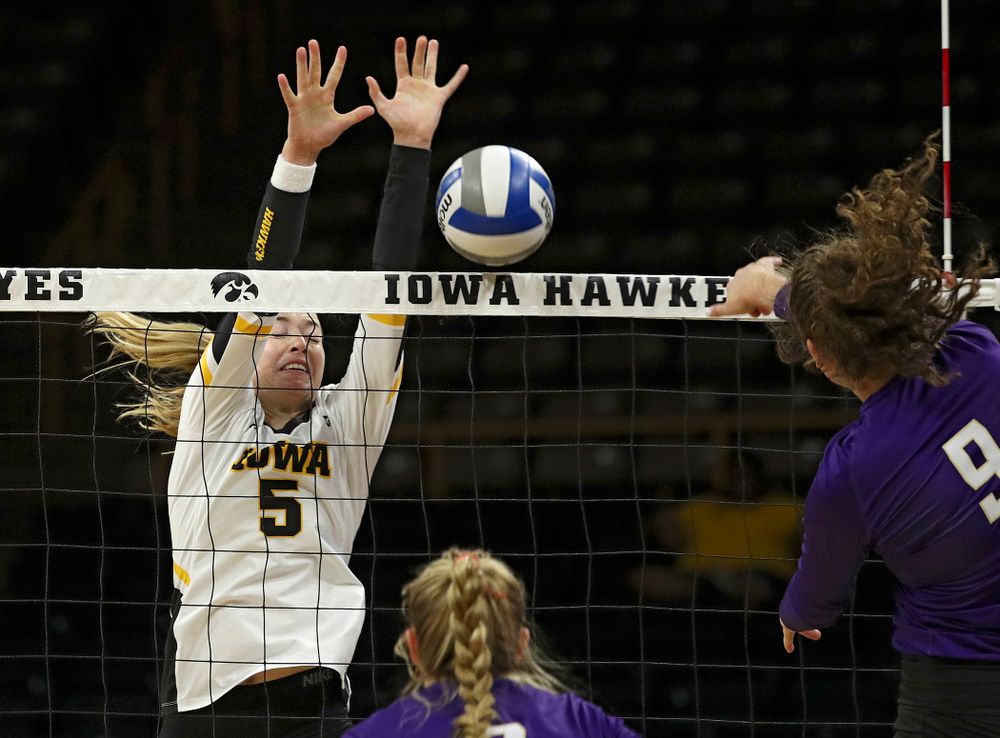 Iowa’s Meghan Buzzerio (5) blocks a shot for a score during their Big Ten/Pac-12 Challenge match at Carver-Hawkeye Arena in Iowa City on Saturday, Sep 7, 2019. (Stephen Mally/hawkeyesports.com)