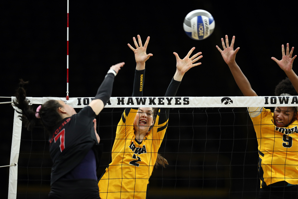 Iowa Hawkeyes setter Courtney Buzzerio (2) and middle blocker Amiya Jones (9) against the Rutgers Scarlet Knights Saturday, November 2, 2019 at Carver-Hawkeye Arena. (Brian Ray/hawkeyesports.com)