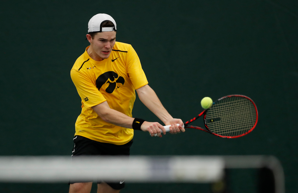 Jonas Larsen against the Illinois Fighting Illini Saturday, March 31, 2018 at Hawkeye Tennis and Recreation Center. (Brian Ray/hawkeyesports.com)