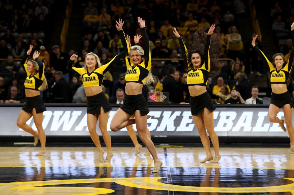 The Iowa Spirit Squad performs with participants in Spirit Squad Day at halftime of the Iowa Hawkeyes game against the Nebraska Cornhuskers Saturday, February 8, 2020 at Carver-Hawkeye Arena. (Brian Ray/hawkeyesports.com)