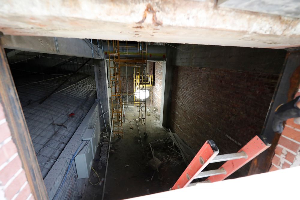 A new opening that connects the club level of the new north end zone to a service corridor, and storage area in the west stands under the press box Wednesday, June 6, 2018 at Kinnick Stadium. The corridor allows the club area to utilize the commercial kitchen in the press box. (Brian Ray/hawkeyesports.com)