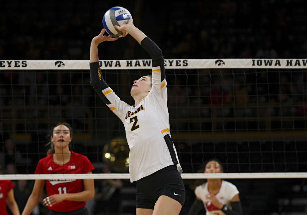 Iowa’s Courtney Buzzerio (2) sets the ball during the first set of their match against Nebraska at Carver-Hawkeye Arena in Iowa City on Saturday, Nov 9, 2019. (Stephen Mally/hawkeyesports.com)
