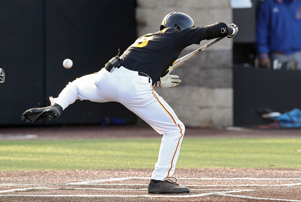 Iowa outfielder Ben Norman (9) is hit by a pitch during the fourth inning of their college baseball game at Duane Banks Field in Iowa City on Tuesday, March 10, 2020. (Stephen Mally/hawkeyesports.com)