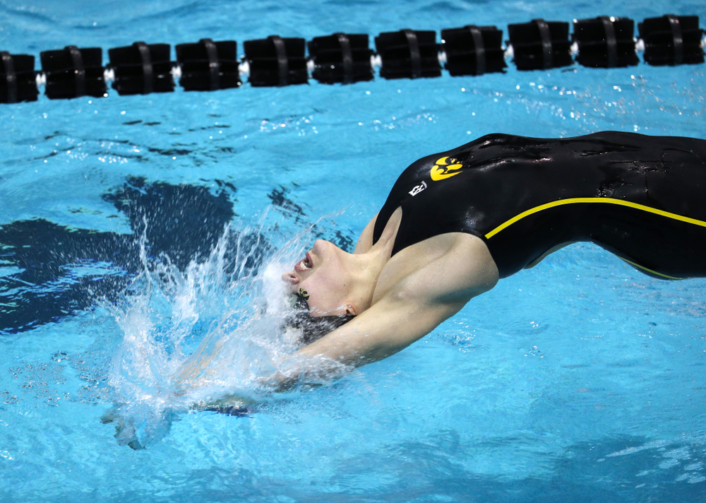 Iowa's Hannah Burvill swims the 100-yard backstroke against the Iowa State Cyclones in the Iowa Corn Cy-Hawk Series Friday, December 7, 2018 at at the Campus Recreation and Wellness Center. (Brian Ray/hawkeyesports.com)