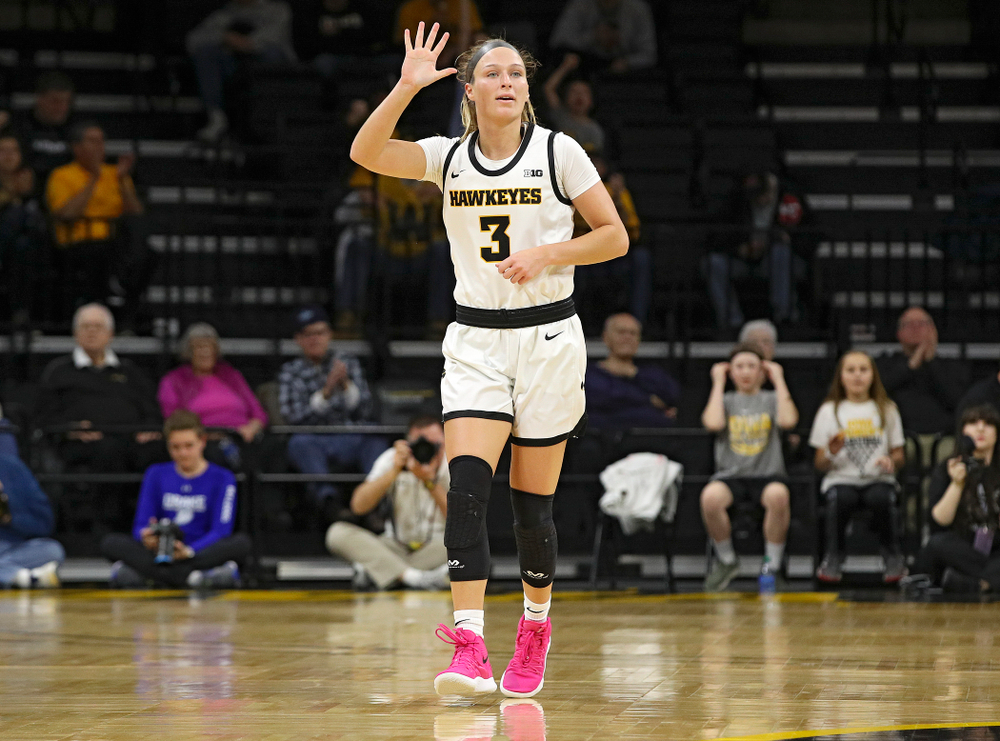 Iowa Hawkeyes guard Makenzie Meyer (3) holds up her hand as she calls a play during the first quarter of their game at Carver-Hawkeye Arena in Iowa City on Saturday, December 21, 2019. (Stephen Mally/hawkeyesports.com)