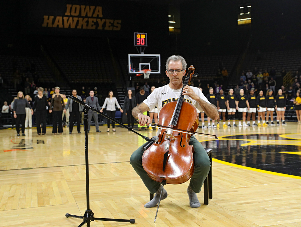 Anthony Arnone performs the National Anthem on his cello before Iowa’s overtime win against Princeton at Carver-Hawkeye Arena in Iowa City on Wednesday, Nov 20, 2019. (Stephen Mally/hawkeyesports.com)