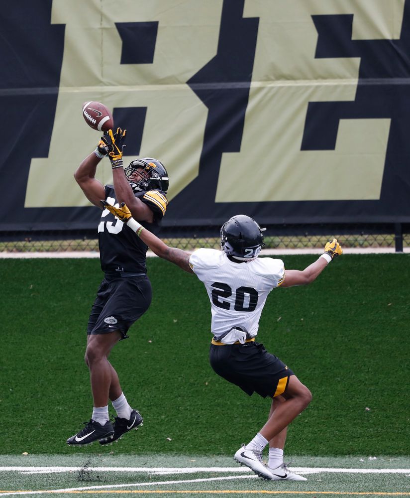 Iowa Hawkeyes wide receiver Dominique Dafney (23) and defensive back Julius Brents (20) during practice No. 4 of Fall Camp Monday, August 6, 2018 at the Hansen Football Performance Center. (Brian Ray/hawkeyesports.com)