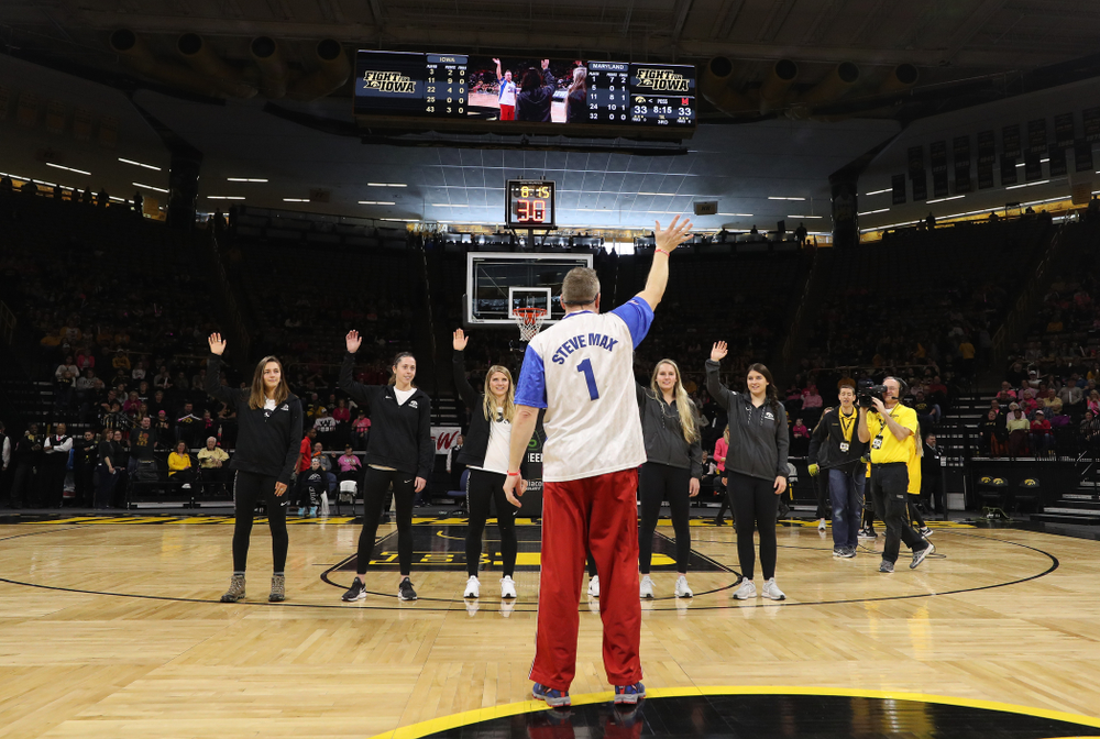 The Iowa Field Hockey Team, Soccer Team, Tennis Team, and Volleyball team play Simon Sez as they celebrate National Girls and Women in Sports day during halftime of the Iowa Hawkeyes game against the seventh ranked Maryland Terrapins Sunday, February 17, 2019 at Carver-Hawkeye Arena. (Brian Ray/hawkeyesports.com)