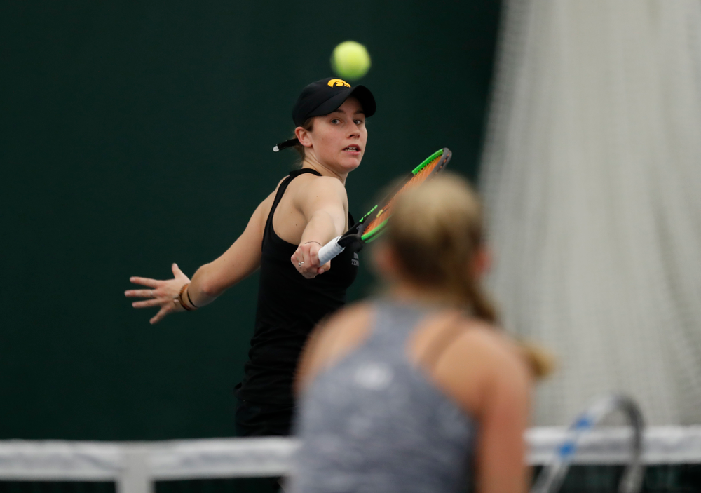 Elise Van Heuvelen and Anastasia Reimchen play a doubles match against Ohio State Sunday, March 25, 2018 at the Hawkeye Tennis and Recreation Center. (Brian Ray/hawkeyesports.com)