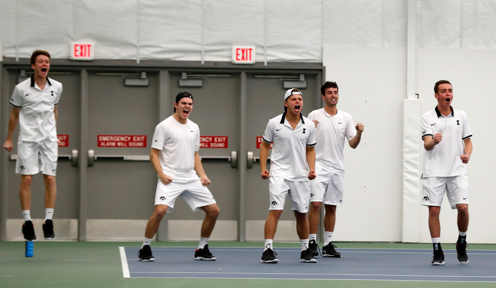 The Iowa Hawkeyes cheer on Piotr Smietana against Purdue Sunday, April 15, 2018 at the Hawkeye Tennis and Recreation Center. (Brian Ray/hawkeyesports.com)