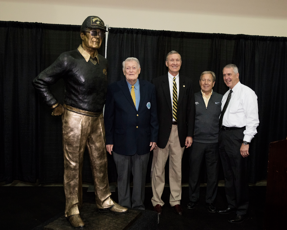Legendary Hawkeye Football Coach Hayden Fry stands with UI President Bruce Harreld and UI Director of Athletics Gary Barta, and MidWestOne Bank president and CEO Charlie Funk following the unveiling of his statue during Fry Fest Friday, September 2, 2016 at the Coralville Marriott Hotel and Conference Center. (Brian Ray/hawkeyesports.com)
