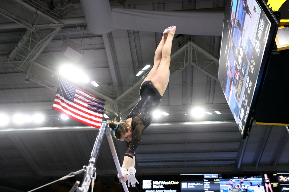Iowa’s Mackenzie Vance competes on the bars against Michigan Friday, February 14, 2020 at Carver-Hawkeye Arena. (Brian Ray/hawkeyesports.com)