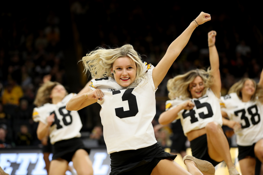 Members of the Hawkeye Football team performs with the Iowa Dance Team at halftime of the Iowa Hawkeyes game against the Ohio State Buckeyes Thursday, February 20, 2020 at Carver-Hawkeye Arena. (Brian Ray/hawkeyesports.com)