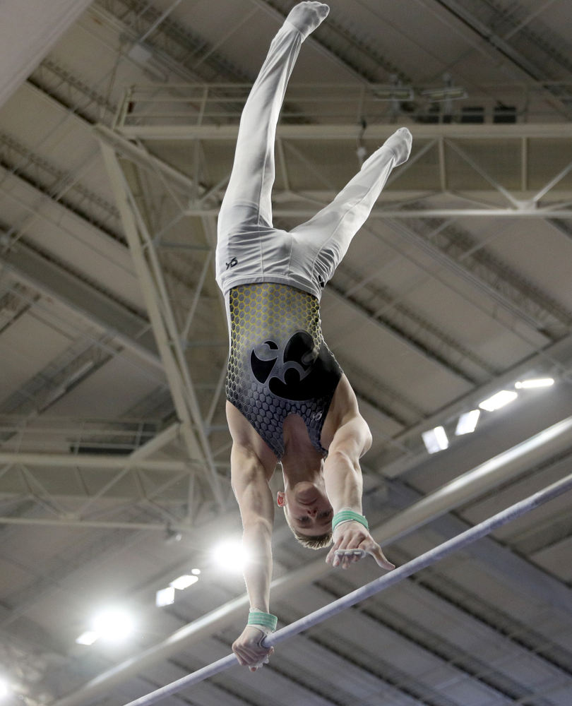 Iowa’s Carter Tope competes on the high bar against UIC and Minnesota Saturday, February 1, 2020 at Carver-Hawkeye Arena. (Brian Ray/hawkeyesports.com)