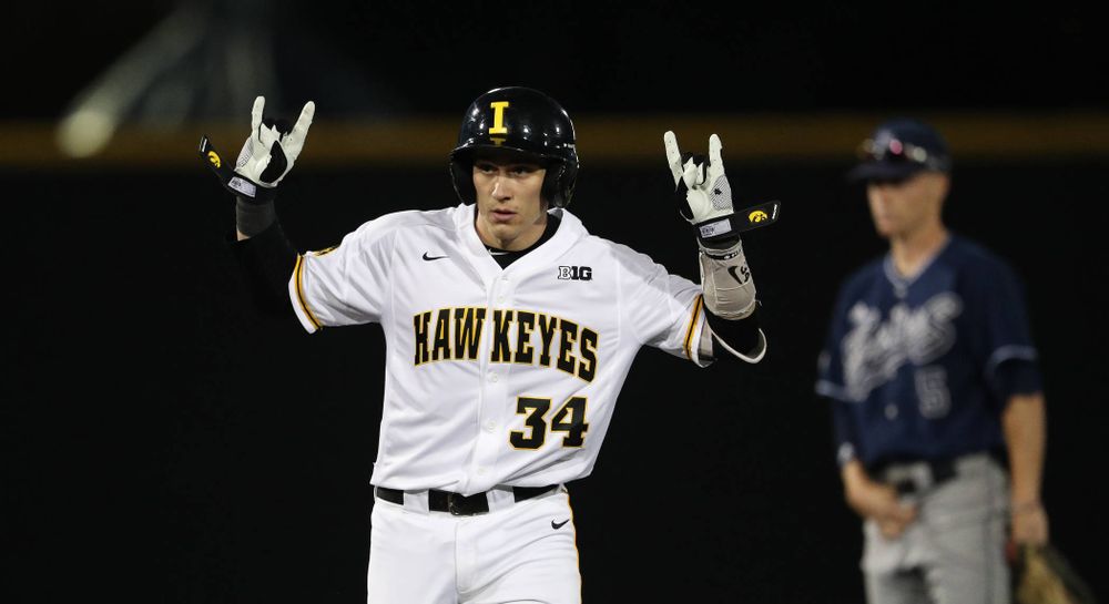 Iowa Hawkeyes catcher Austin Martin (34) doubles during game one against UC Irvine Friday, May 3, 2019 at Duane Banks Field. (Brian Ray/hawkeyesports.com)