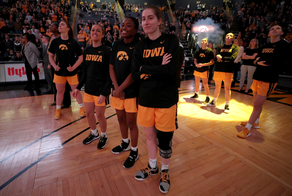 Iowa Hawkeyes guard Kate Martin (20) and guard Tomi Taiwo (1) against the Minnesota Golden Gophers Thursday, February 27, 2020 at Carver-Hawkeye Arena. (Brian Ray/hawkeyesports.com)
