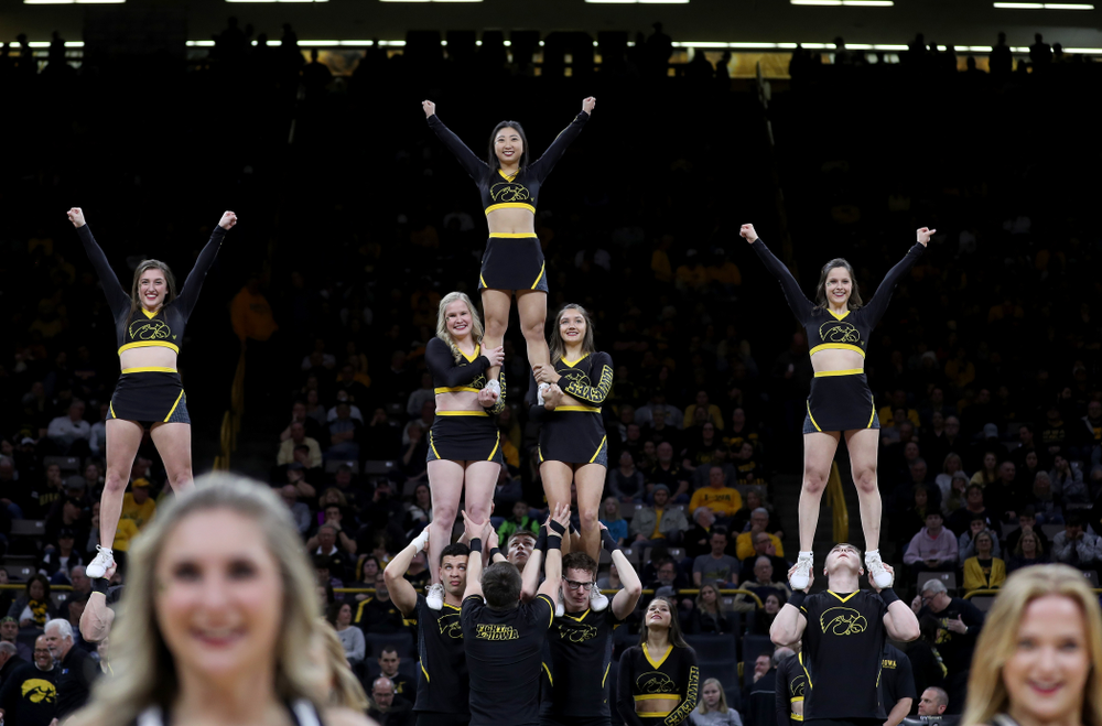 The Iowa Cheerleaders and Dance Team perform on senior night at half-time of the Iowa Hawkeyes game against the Purdue Boilermakers Tuesday, March 3, 2020 at Carver-Hawkeye Arena. (Brian Ray/hawkeyesports.com)
