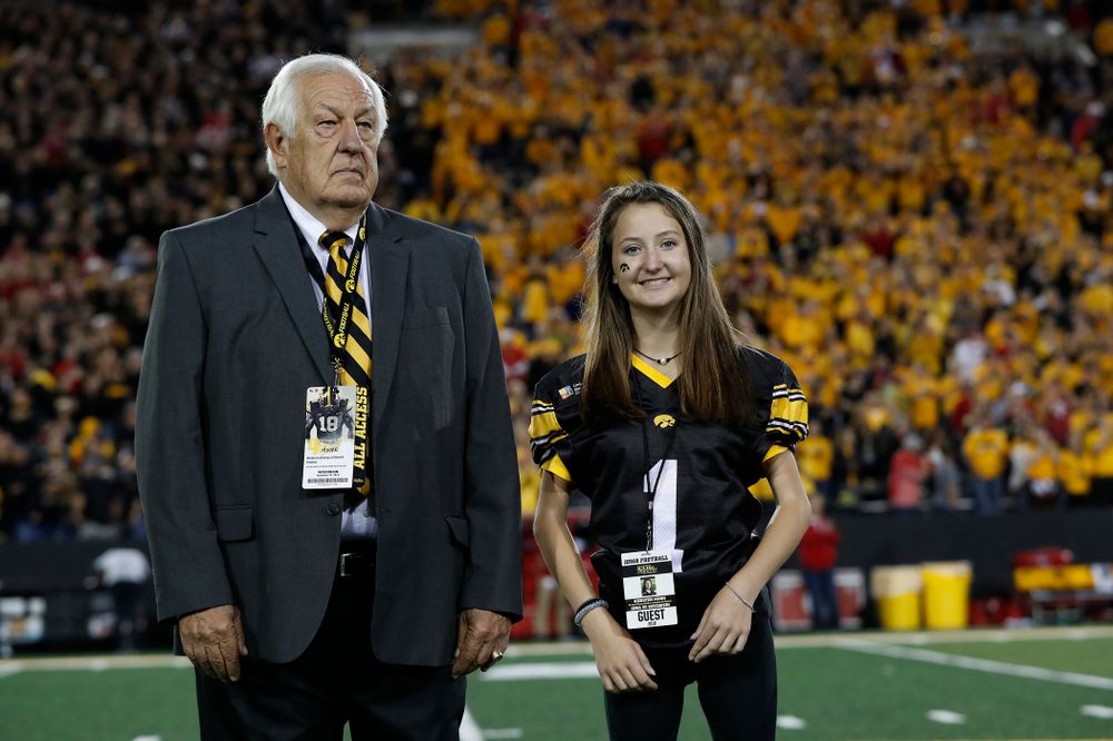 Honorary Captain Tom Moore and Kid Captain Kiersten Mann before the Iowa Hawkeyes game against the Wisconsin Badgers Saturday, September 22, 2018 at Kinnick Stadium. (Brian Ray/hawkeyesports.com)