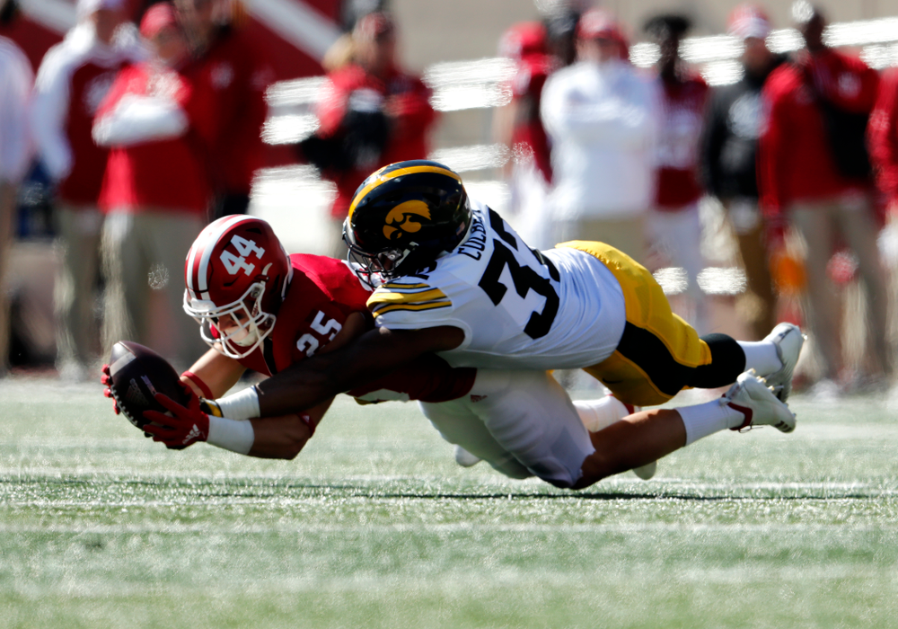 Iowa Hawkeyes linebacker Djimon Colbert (32) breaks up a pass against the Indiana Hoosiers Saturday, October 13, 2018 at Memorial Stadium, in Bloomington, Ind. (Brian Ray/hawkeyesports.com)