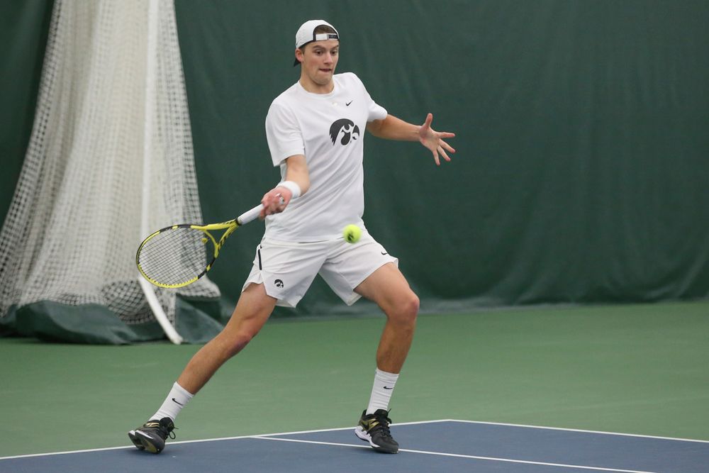 Iowa’s Joe Tyler returns a hit during the Iowa men’s tennis meet vs Nebraska on Sunday, March 1, 2020 at the Hawkeye Tennis and Recreation Complex. (Lily Smith/hawkeyesports.com)