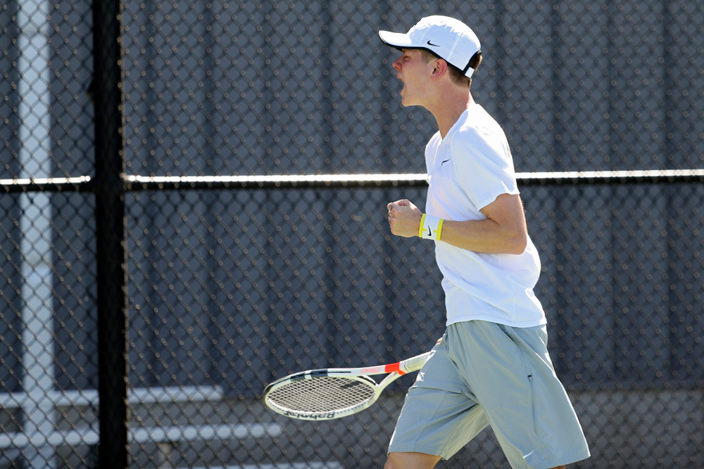 Iowa's Jason Kerst celebrates a point during his match against Michigan at the Hawkeye Tennis and Recreation Complex in Iowa City on Sunday, Apr. 21, 2019. (Stephen Mally/hawkeyesports.com)