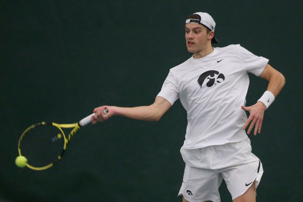Iowa’s Joe Tyler returns a hit during the Iowa men’s tennis meet vs Nebraska on Sunday, March 1, 2020 at the Hawkeye Tennis and Recreation Complex. (Lily Smith/hawkeyesports.com)