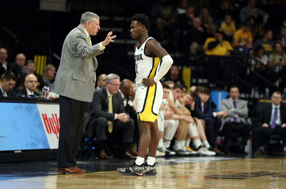 Iowa Hawkeyes guard Joe Toussaint (1) and assistant coach Kirk Speraw against Oral Roberts Friday, November 15, 2019 at Carver-Hawkeye Arena. (Brian Ray/hawkeyesports.com)