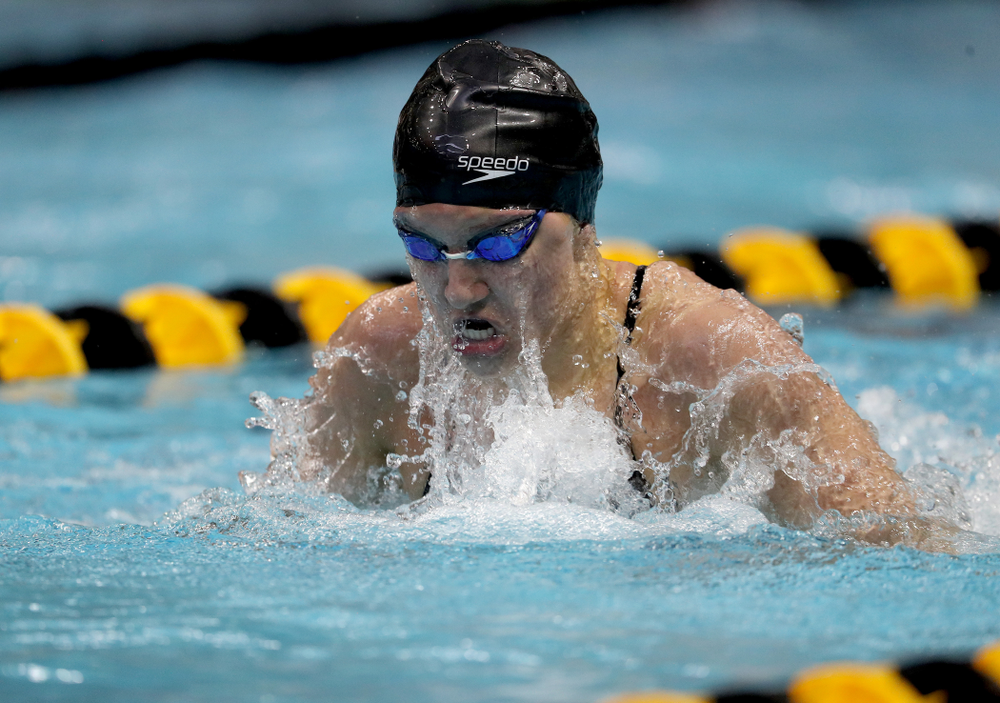 IowaÕs Sage Ohlensehlen competes in the 100 yard breaststroke against Notre Dame and Illinois Saturday, January 11, 2020 at the Campus Recreation and Wellness Center. (Brian Ray/hawkeyesports.com)