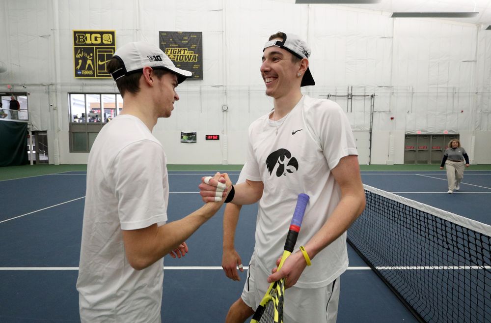Iowa’s Karem Allaf and Nikita Snezhko play a doubles match against Cornell Sunday, March 8, 2020 at the Hawkeye Tennis and Recreation Center. (Brian Ray/hawkeyesports.com)