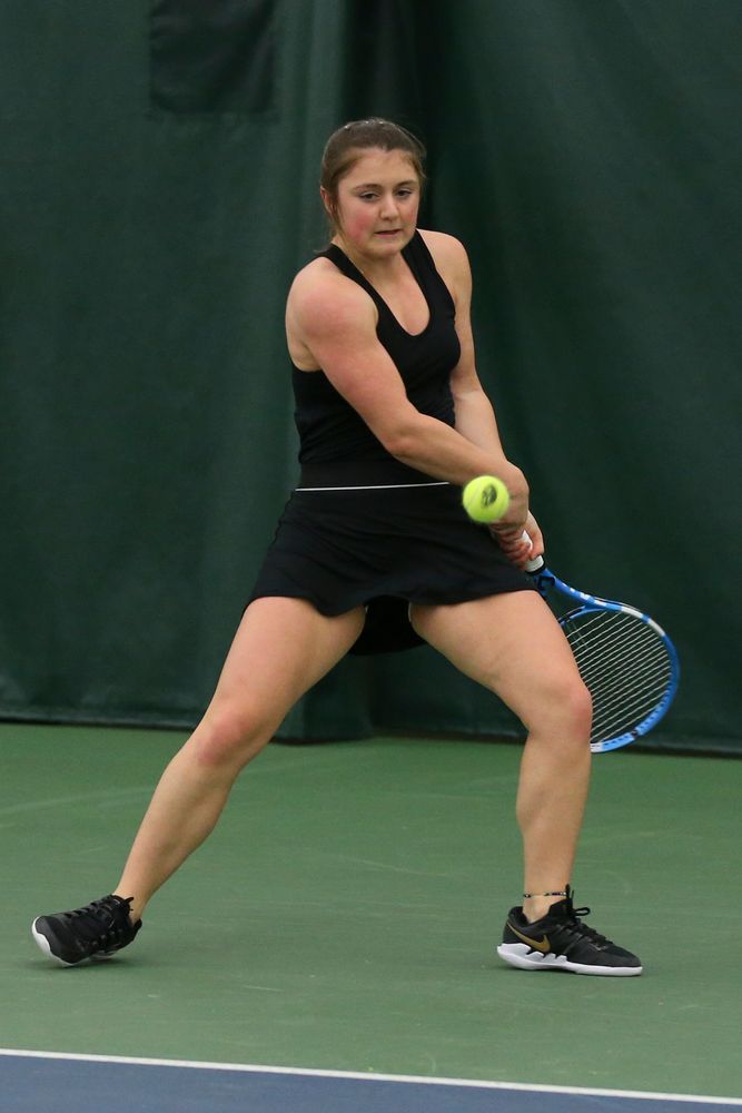 Iowa’s Erika Dodridge returns a hit during the Iowa women’s tennis meet vs UNI on Saturday, February 29, 2020 at the Hawkeye Tennis and Recreation Complex. (Lily Smith/hawkeyesports.com)