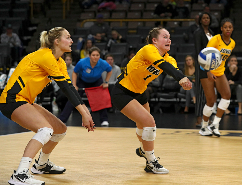 Iowa’s Joslyn Boyer (1) gets a dig as Kyndra Hansen (8) looks on during the second set of their match against Illinois at Carver-Hawkeye Arena in Iowa City on Wednesday, Nov 6, 2019. (Stephen Mally/hawkeyesports.com)