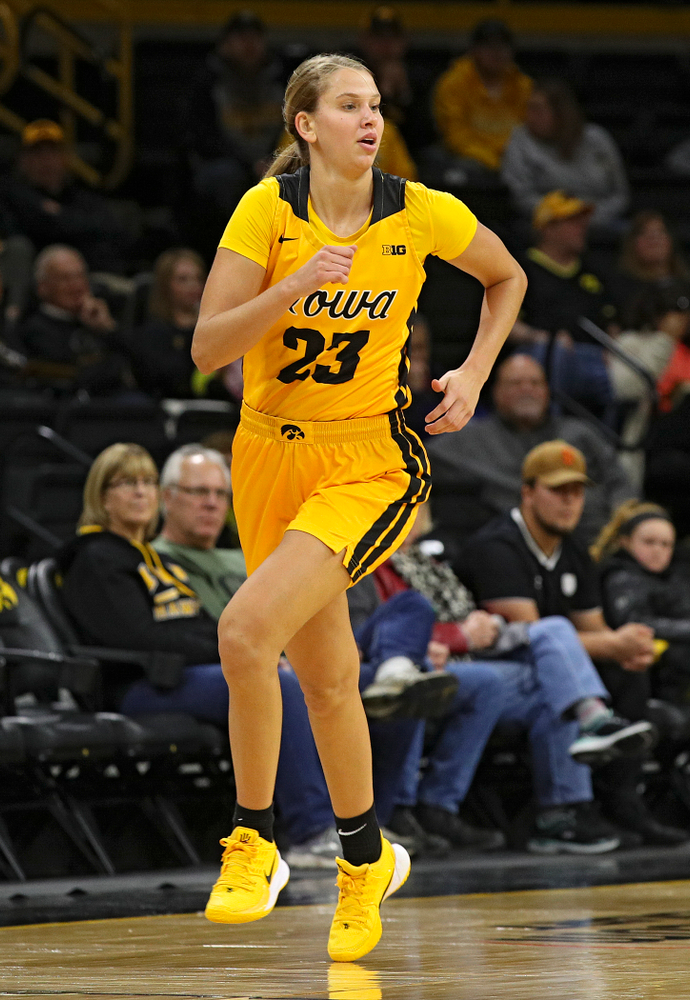 Iowa forward Logan Cook (23) runs down the court during the third quarter of their game against Winona State at Carver-Hawkeye Arena in Iowa City on Sunday, Nov 3, 2019. (Stephen Mally/hawkeyesports.com)