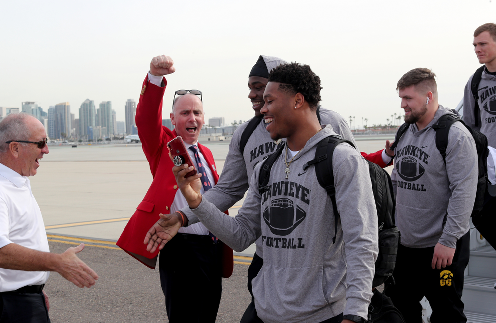Iowa Hawkeyes wide receiver Tyrone Tracy Jr. (3) and defensive tackle Daviyon Nixon (54) after arriving in San Diego, CA Saturday, December 21, 2019 for the Holiday Bowl. (Brian Ray/hawkeyesports.com)
