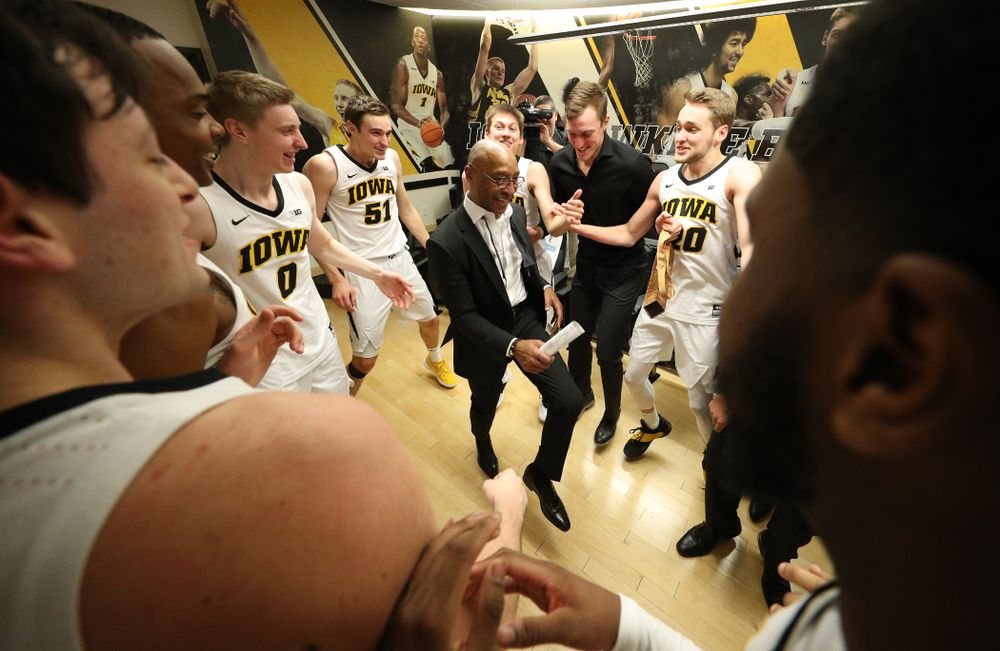 Iowa Hawkeyes assistant coach Sherman Dillard dances in the locker room following their victory over the Michigan Wolverines Friday, February 1, 2019 at Carver-Hawkeye Arena. (Brian Ray/hawkeyesports.com)
