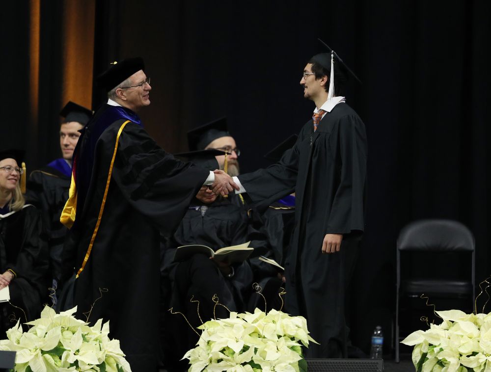 Iowa Football's Miguel Recinos during the Fall Commencement Ceremony Saturday, December 15, 2018 at Carver-Hawkeye Arena. (Brian Ray/hawkeyesports.com)