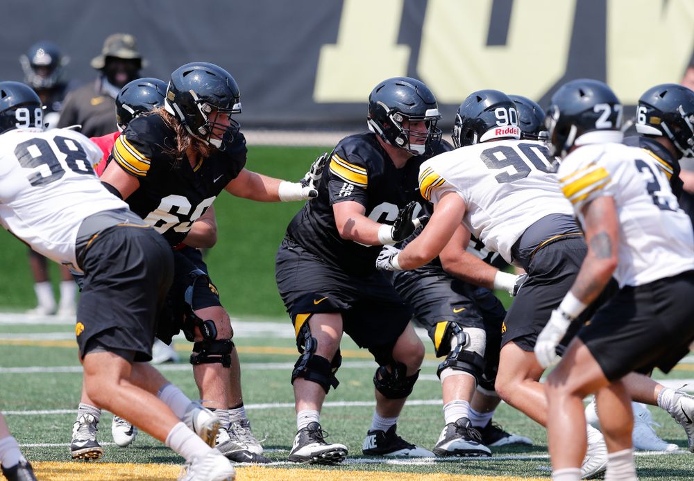Iowa Hawkeyes offensive lineman Landan Paulsen (68) and offensive lineman Keegan Render (69) during practice No. 7 of fall camp Friday, August 10, 2018 at the Kenyon Football Practice Facility. (Brian Ray/hawkeyesports.com)