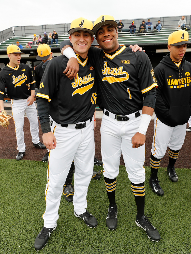 Iowa Hawkeyes infielder Tanner Wetrich (16) and third baseman Lorenzo Elion (1) against the Bradley Braves Wednesday, March 28, 2018 at Duane Banks Field. (Brian Ray/hawkeyesports.com)
