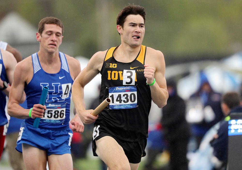 Iowa's Carter Lilly runs the men's sprint medley relay event during the third day of the Drake Relays at Drake Stadium in Des Moines on Saturday, Apr. 27, 2019. (Stephen Mally/hawkeyesports.com)