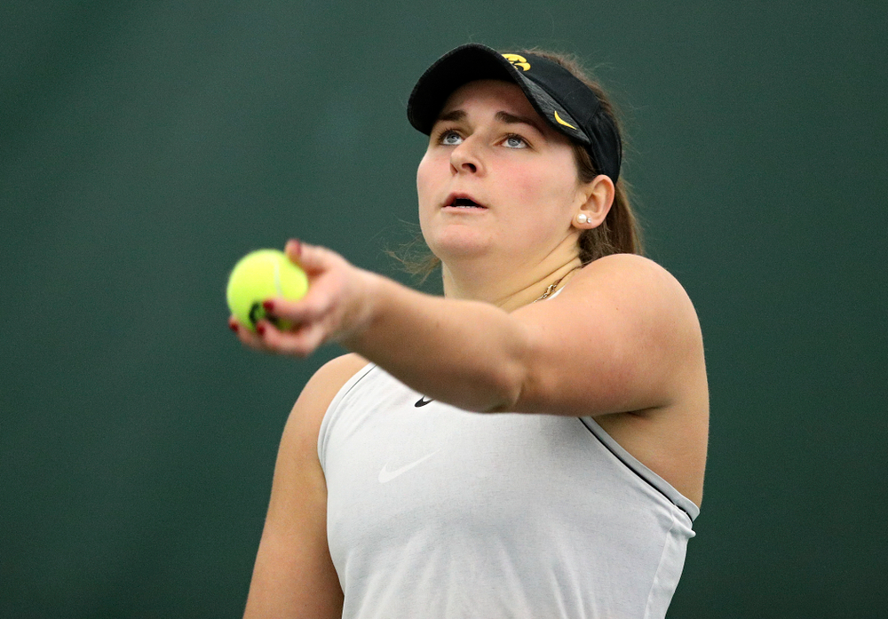 Iowa’s Danielle Bauers serves during her singles match at the Hawkeye Tennis and Recreation Complex in Iowa City on Sunday, February 16, 2020. (Stephen Mally/hawkeyesports.com)