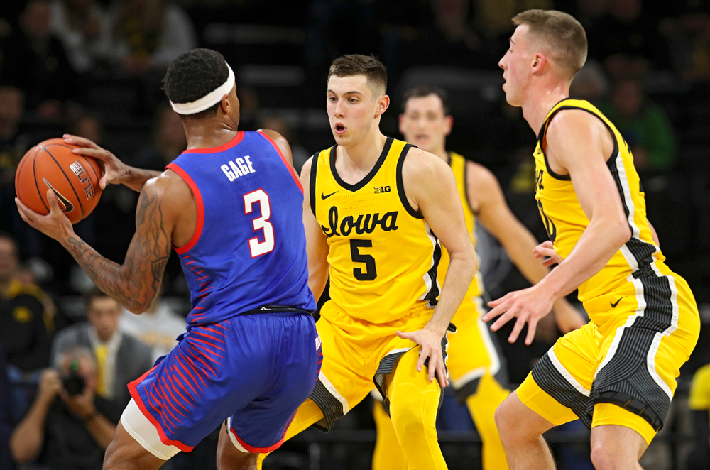 Iowa Hawkeyes guard CJ Fredrick (5) and guard Joe Wieskamp (10) apply pressure during the first half of their game at Carver-Hawkeye Arena in Iowa City on Monday, Nov 11, 2019. (Stephen Mally/hawkeyesports.com)