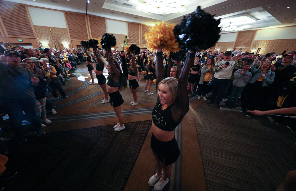 The Hawkeye Marching Band and the Iowa Spirit Squads perform during the Holiday Bowl Hawkeye Huddle Thursday, December 26, 2019 at the Hilton in downtown San Diego. (Brian Ray/hawkeyesports.com)