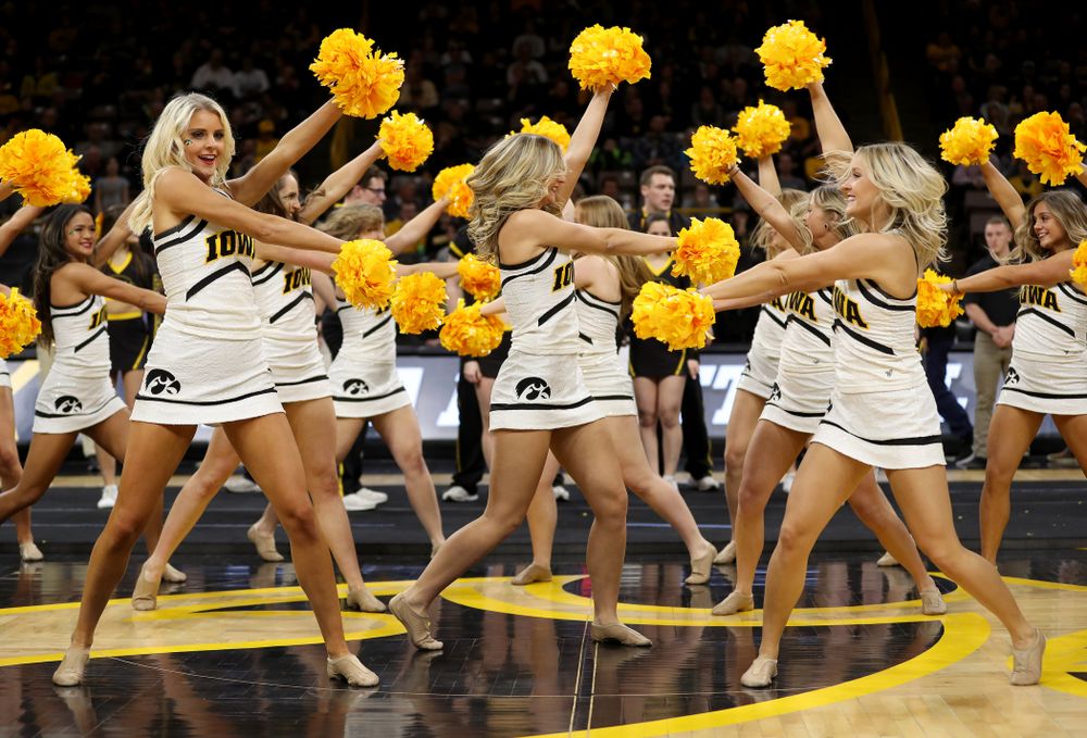 The Iowa Cheerleaders and Dance Team perform on senior night at half-time of the Iowa Hawkeyes game against the Purdue Boilermakers Tuesday, March 3, 2020 at Carver-Hawkeye Arena. (Brian Ray/hawkeyesports.com)
