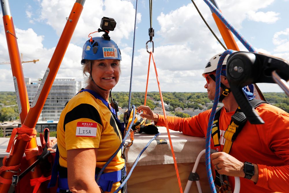 Iowa Women's Basketball head coach Lisa Bluder goes Over The Edge to benefit Ronald McDonald House Charities of Eastern Iowa and Western Illinois Friday, September 14, 2018 in downtown Iowa City.(Brian Ray/hawkeyesports.com)